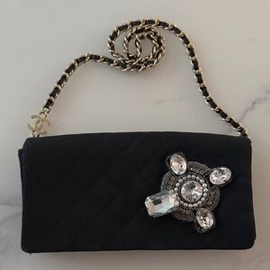CHANEL Black Quilted Clutch with Jewel Accent